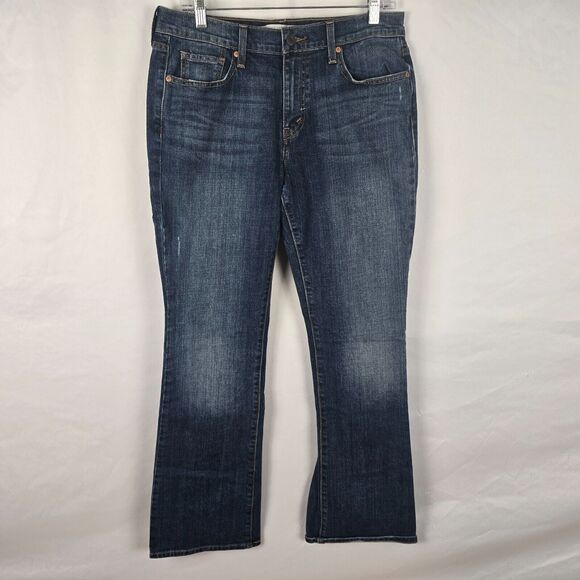 Levi's 515 Jeans Women's 10 Blue Med Wash Bootcut Slight Distress Button Pockets - Picture 1 of 16